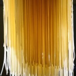 Fresh pasta, hanging to dry before cooking.