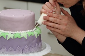 two tiered layered cake, covered and decorated in fondant and royal icing, photos by Laurens de Vries of www.laurens.com