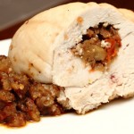 turkey roll with eggplant and tomato stuffing, cooked