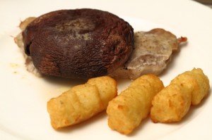 portobello mushroom oven grilled over a thin steak