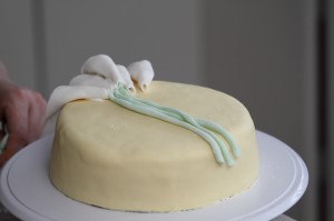 putting stems on the fondant lilies on the cake (photo by LdV)