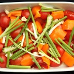 vegetables in casserole dish, ready to be roasted