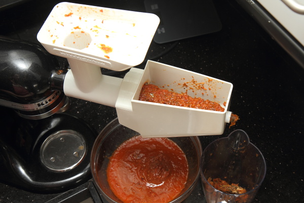 roasted tomato sauce processing through the food mill