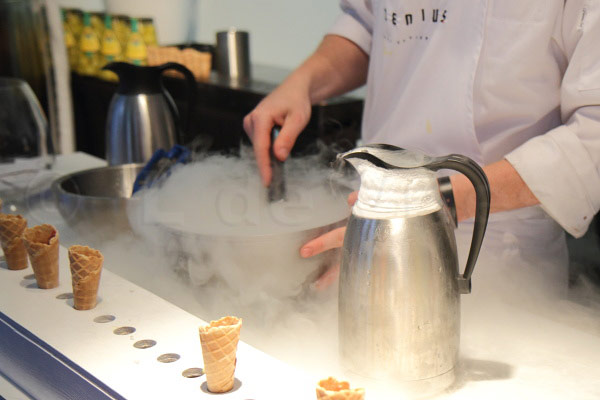 Stirring the composition of the sherbet after adding liquid nitrogen at Taste of Amsterdam